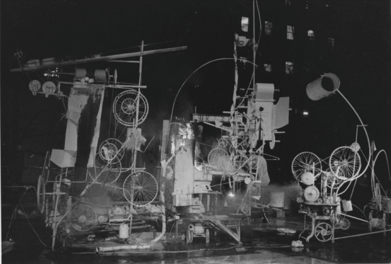 A picture containing text, black, old, projector
Description automatically generated